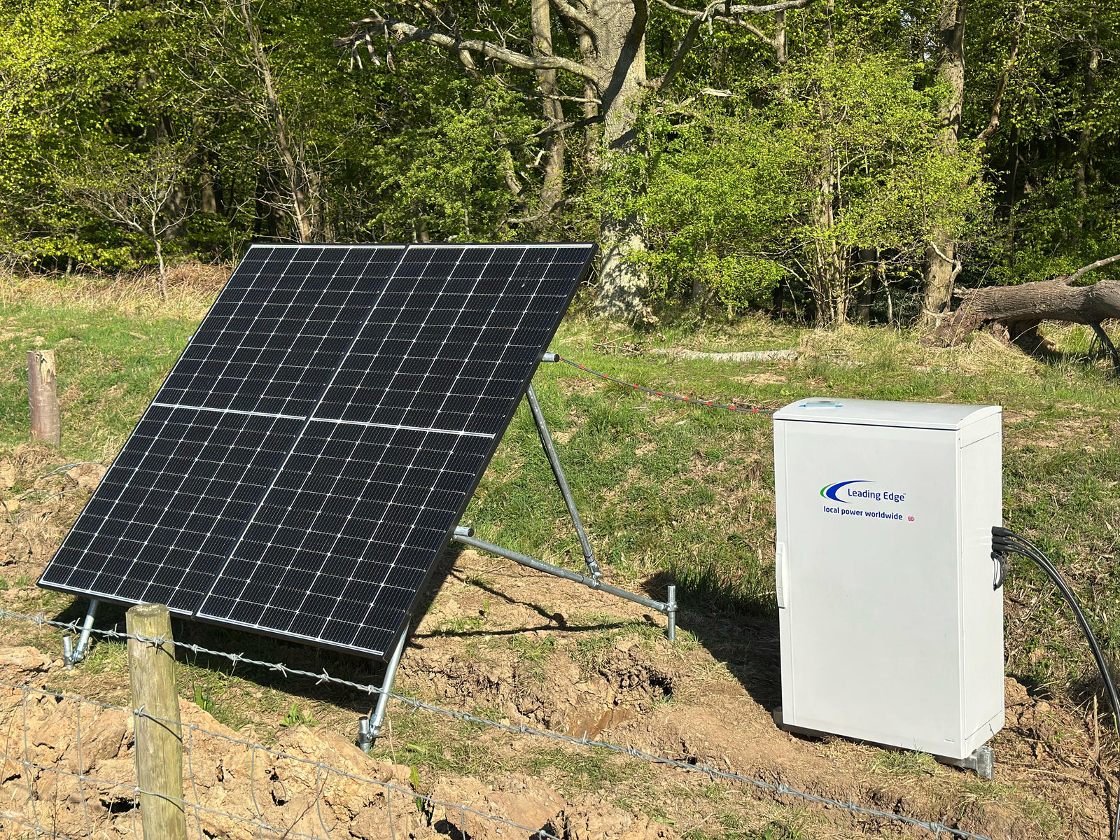 Leading Edge Power cabinet and solar panels complete off-grid system