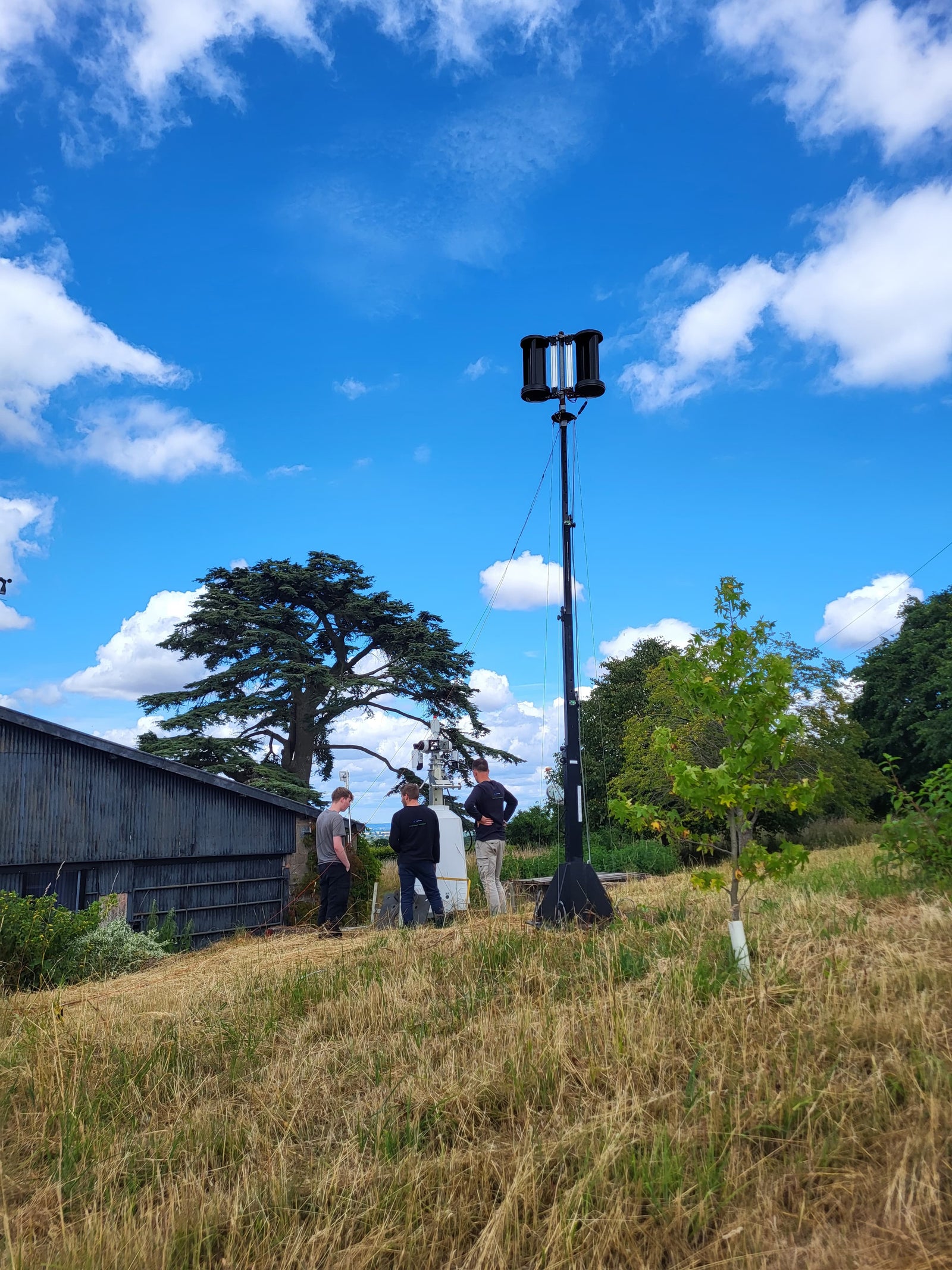 Leading Edge team in field with LEv50s